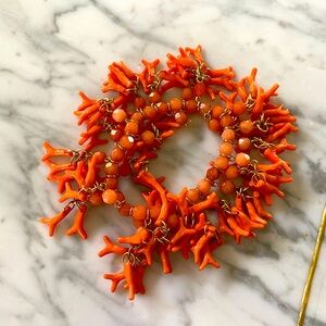 Coral stretchy bracelet.